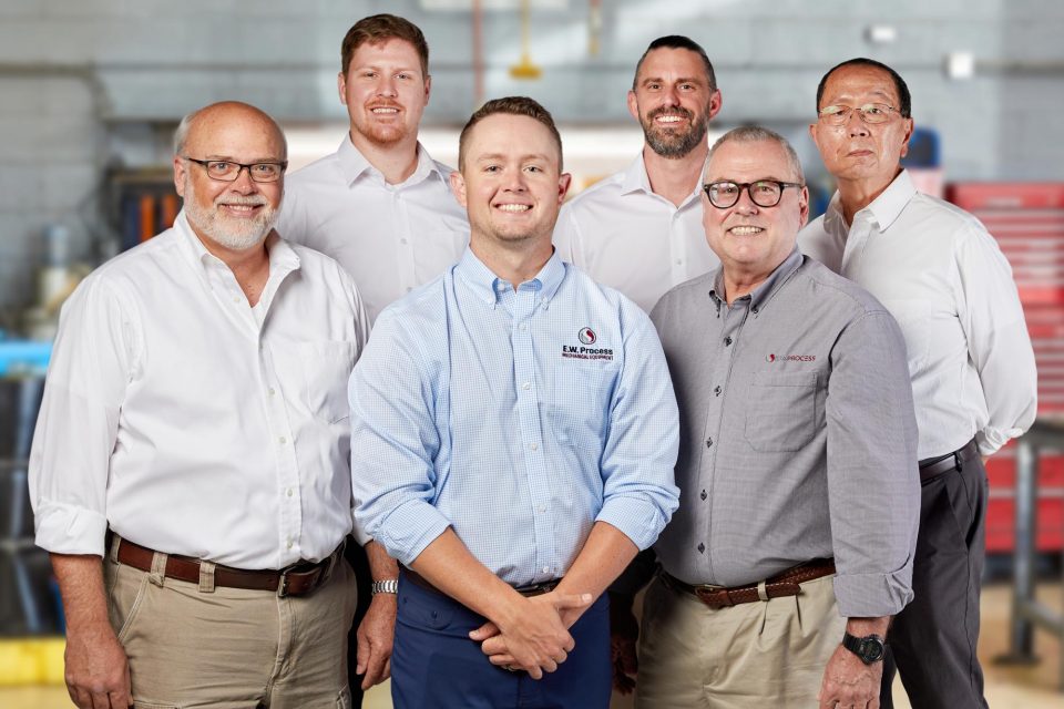 Group photo of male employees at MacGuire & Crawford instrumentation and control company