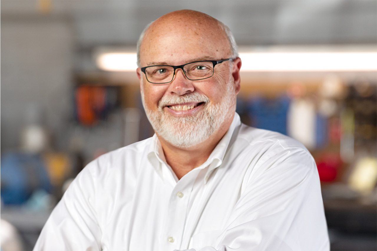 Headshot of MacGuire & Crawford employee Phil Leonard