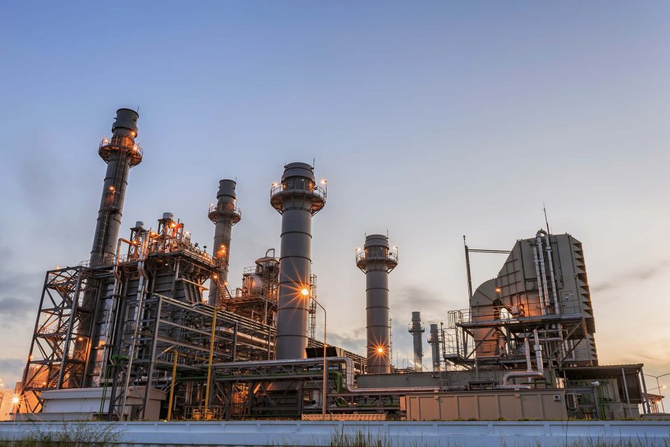 exterior of a power plant at dusk