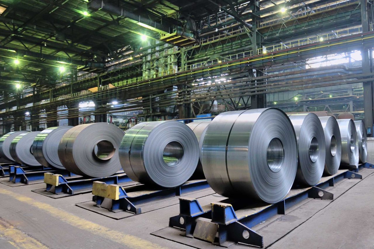 Rows of rolls of steel sheet in a large plant